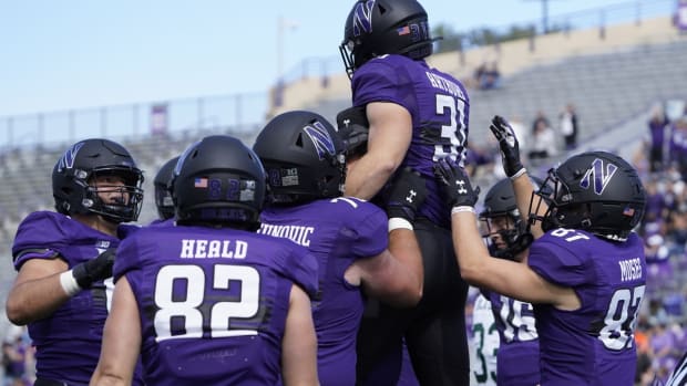 Sep 25, 2021; Evanston, Illinois, USA; Northwestern Wildcats running back Jake Arthurs (31) celebrates his touchdown against the Ohio Bobcats during the second half at Ryan Field. Mandatory Credit: David Banks-USA TODAY Sports